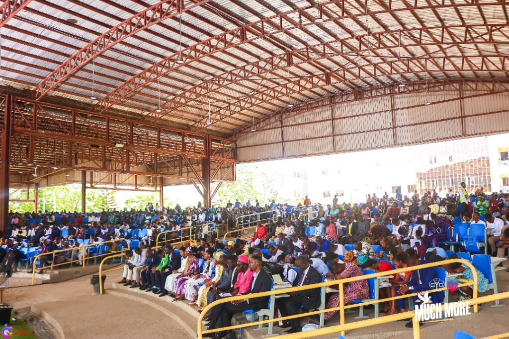 Delegates seated under the arena roof
