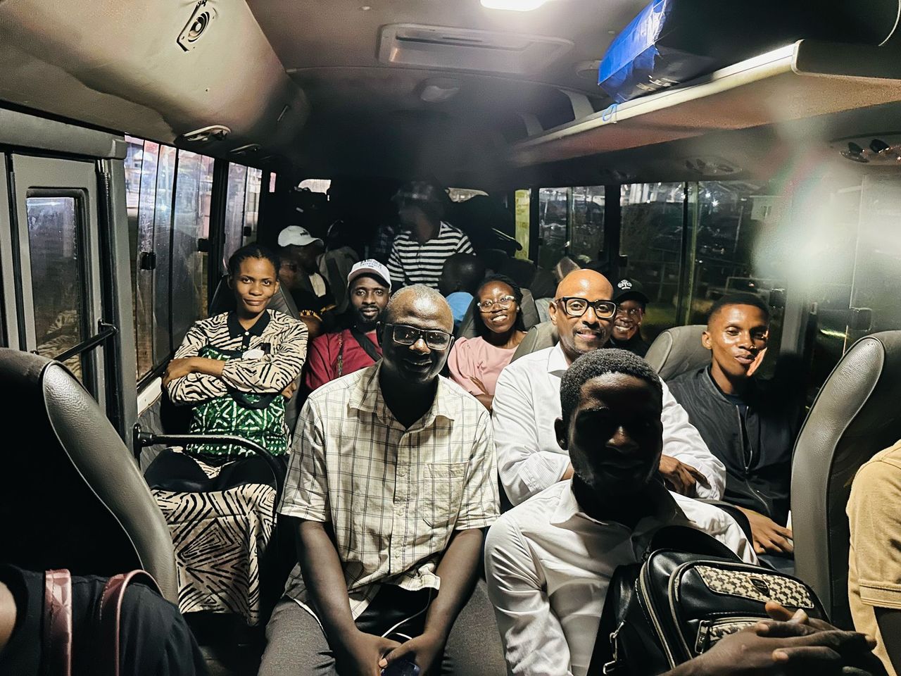 A mission team travelling together by bus