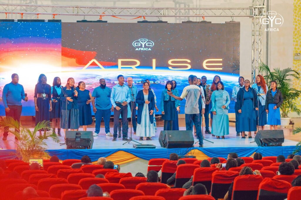 The choir leads worship on the ARISE stage on opening night