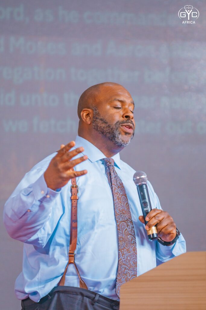 A preacher speaks during a Sunday session