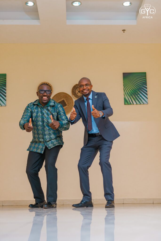Two delegates celebrate together on Monday