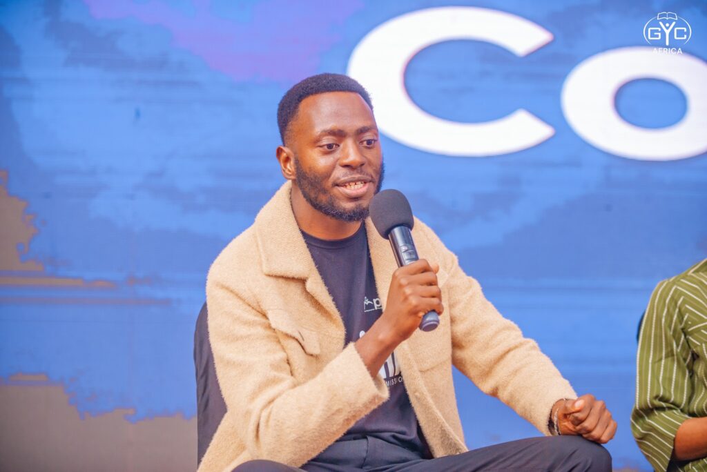 A guest shares his story on stage